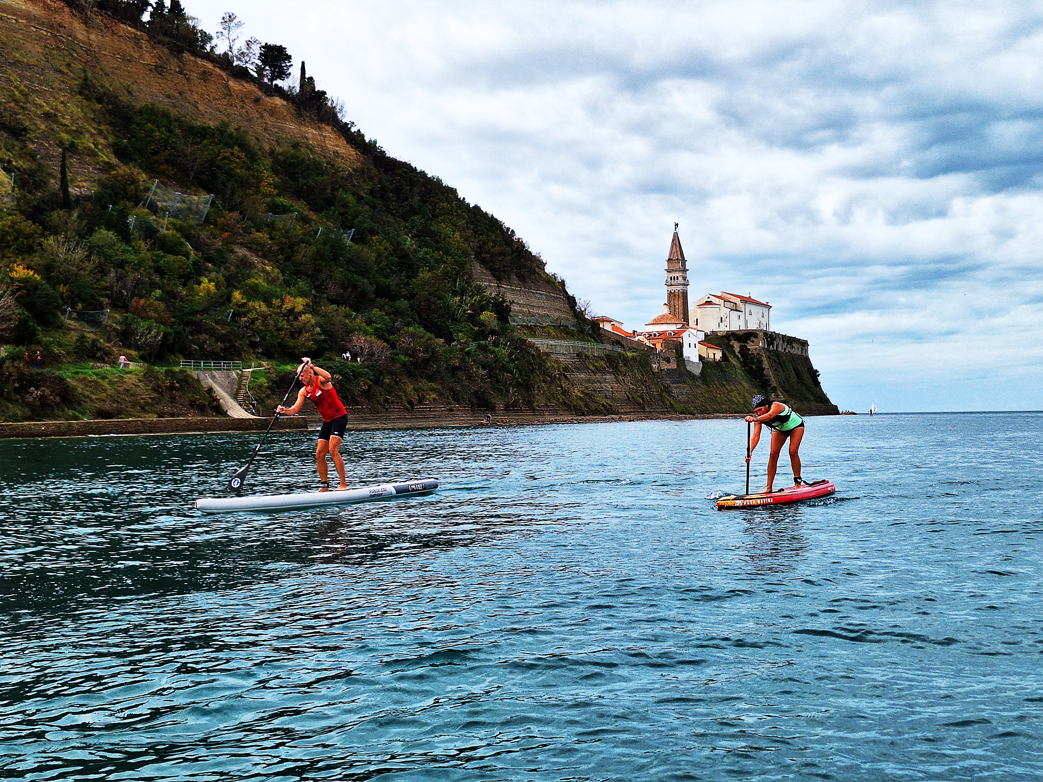 SRL Grand Prix, a stand-up paddle race transcending competition. Against the backdrop of St. George's Parish Church